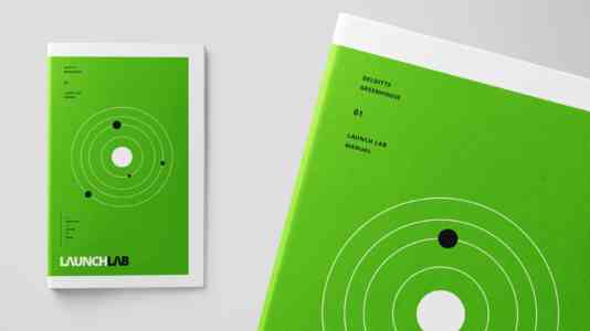 Cover of the Launch Lab curriculum. The booklet is a vibrant green with a simple illustration of the solar system.